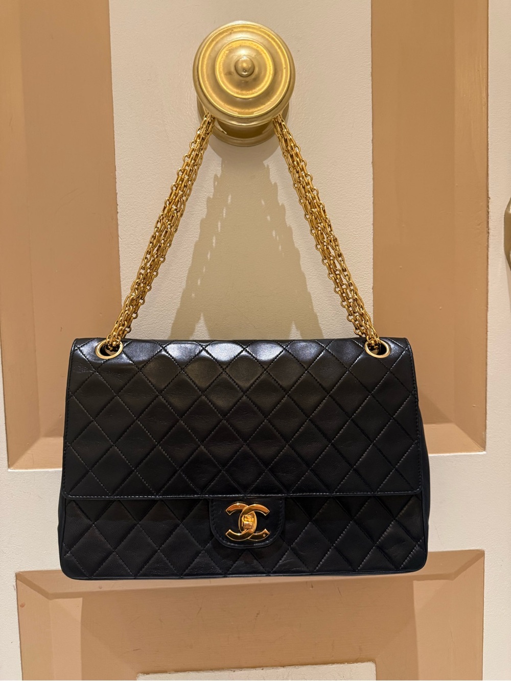 CHANEL Black Quilted Shoulder Bag with Gold Chain